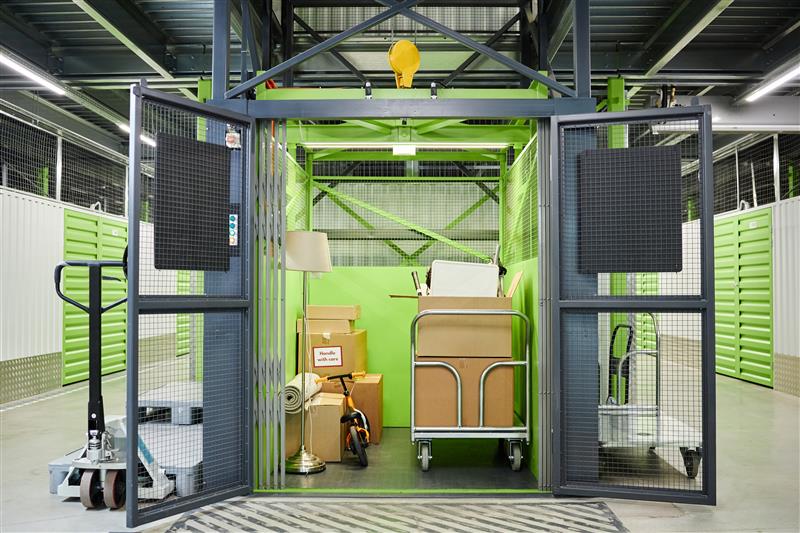 self-storage-unit-holding-packed-boxes-and-househo-2026-03-20-04-10-56-utc